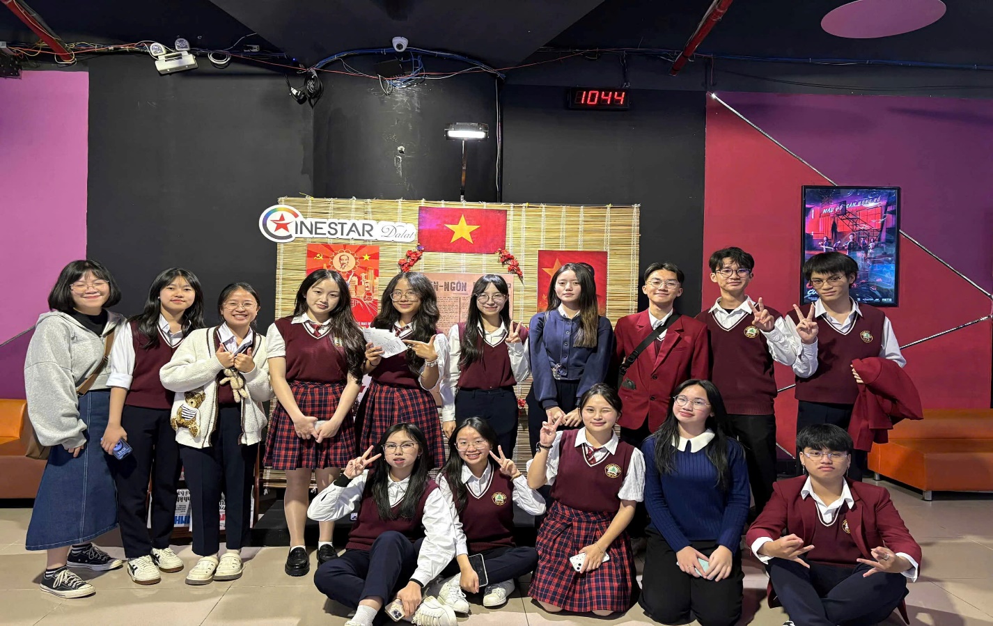 A group of people posing for a photo

Description automatically generated
